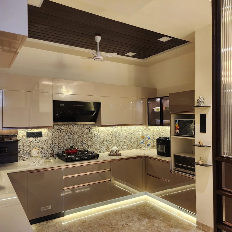 Kitchen with handleless cabinets and under-cabinet lighting