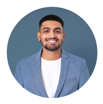 Portrait of a smiling man wearing a grey jacket, turnkey interior design in Bhilai and Raipur